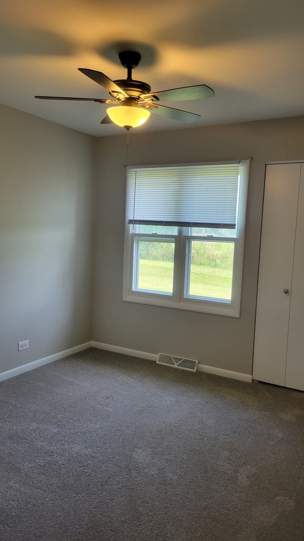 20 Highway Elgin, IL 60124 - Photo 13 of 23 a view of an empty room with a window