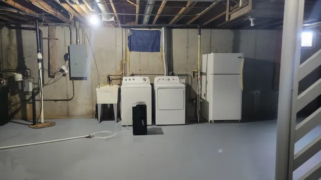 a view of a storage & utility room with washer and dryer