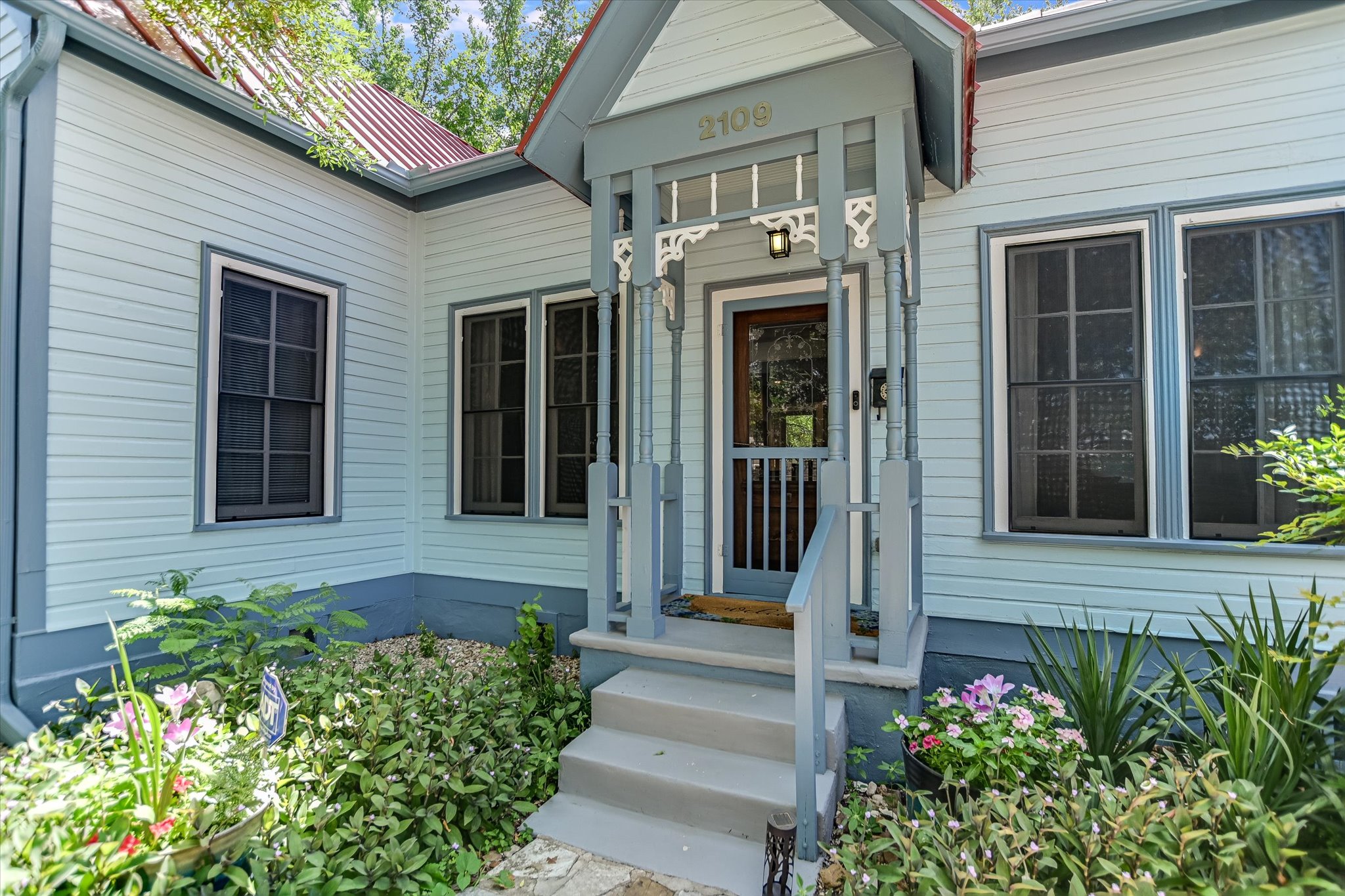 2109 Nickerson Street Austin, TX 78704 - Photo 22 of 23 a front view of a house with a yard
