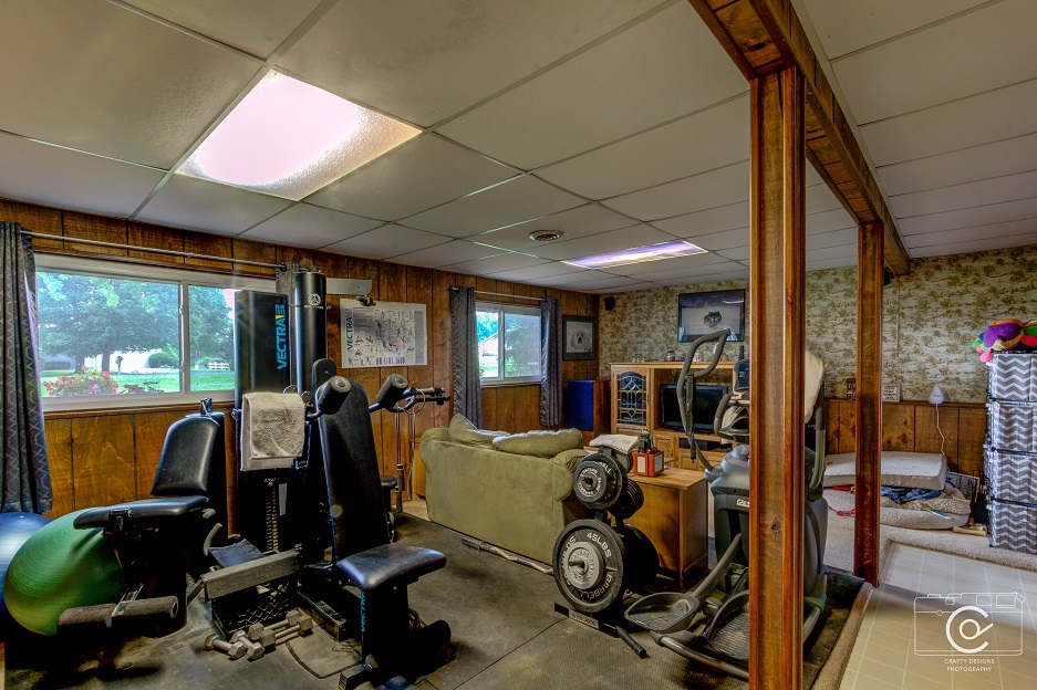 21114 Virginia Road DeKalb, IL 60115 - Photo 22 of 29 a view of a room with gym equipment