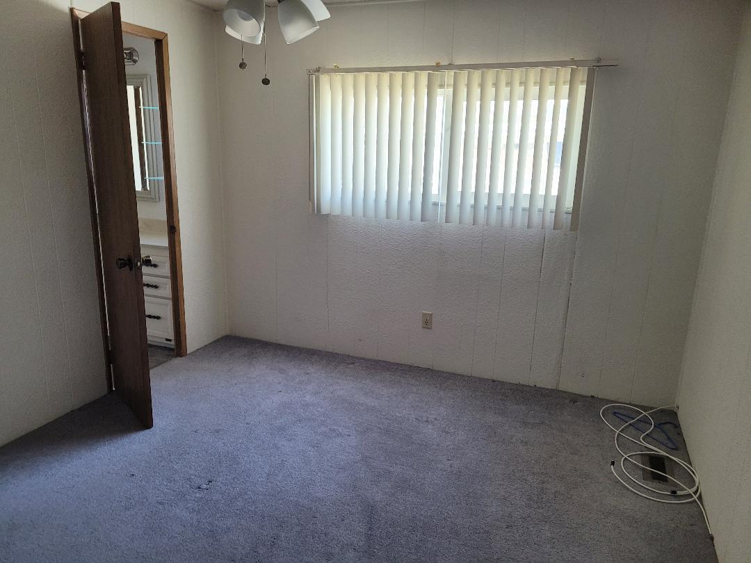 73441 Pine Valley Drive Thousand Palms, CA 92276 - Photo 11 of 12 an empty room with windows