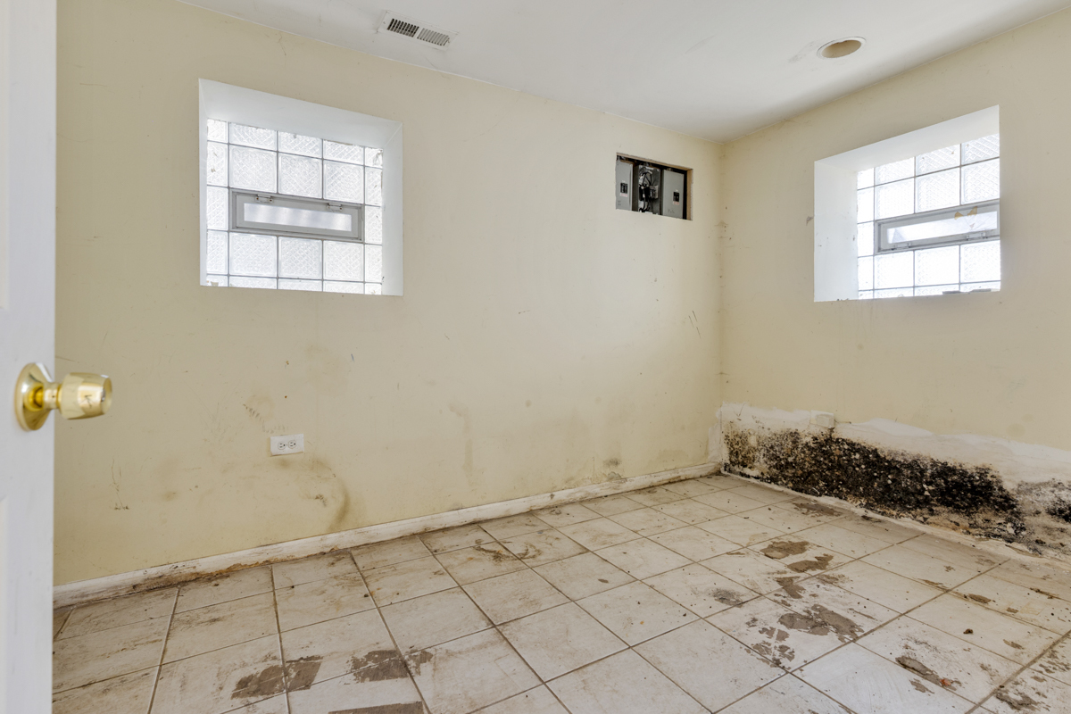 1141 South St Louis Avenue Chicago, IL 60624 - Photo 21 of 26 a view of a room that has a window in it