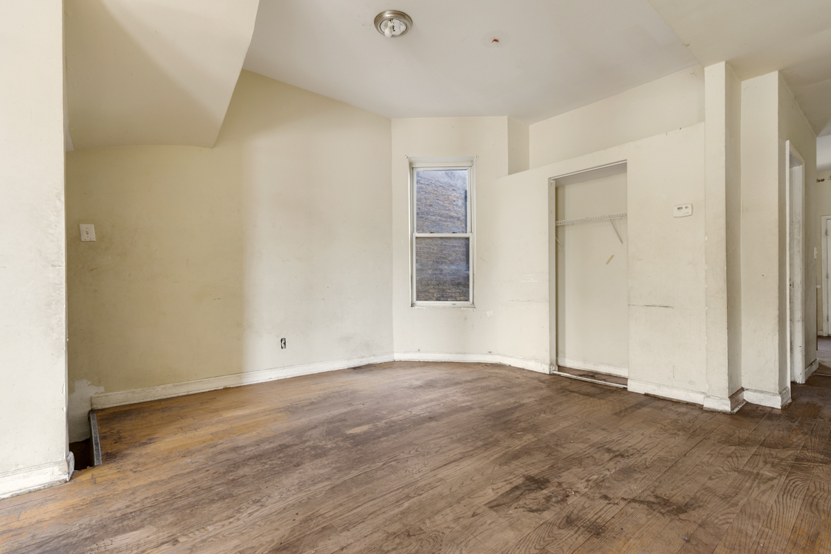 1141 South St Louis Avenue Chicago, IL 60624 - Photo 4 of 26 a view of an empty room