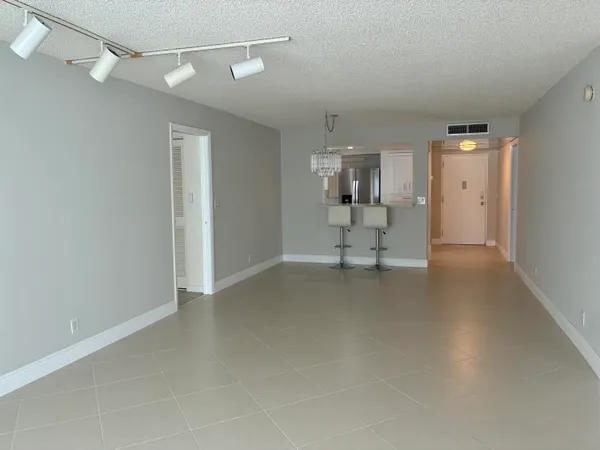 a view of kitchen and windows