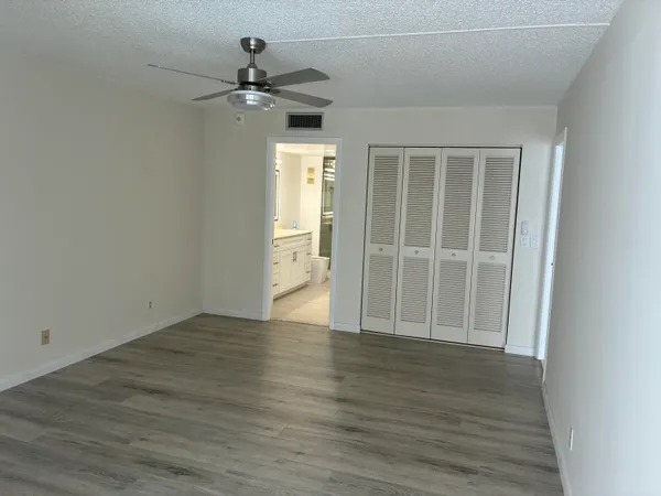 a room with a table and chairs