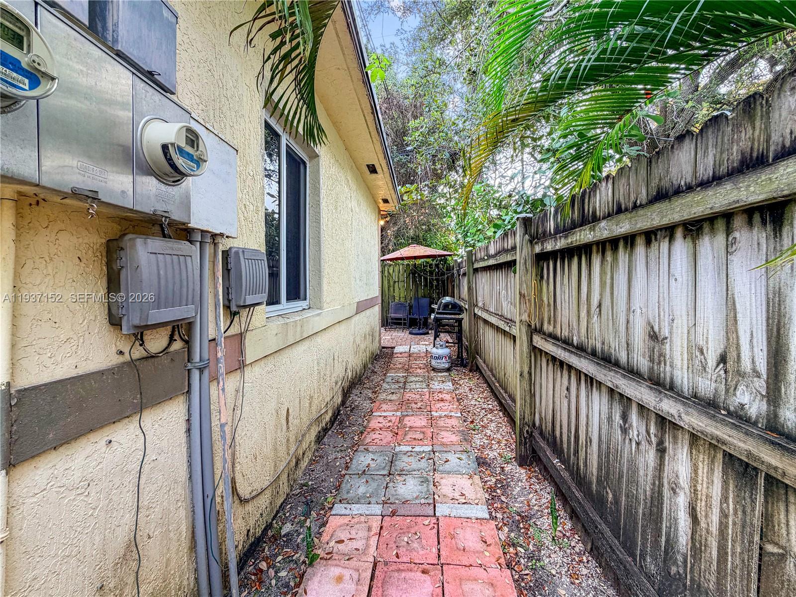 426 Northeast 77th Street, Unit 428 Miami, FL 33138 - Photo 12 of 22 a view of a pathway of a patio