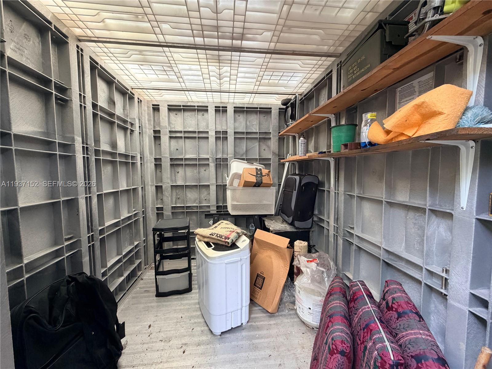 426 Northeast 77th Street, Unit 428 Miami, FL 33138 - Photo 14 of 22 a room with storage and utility