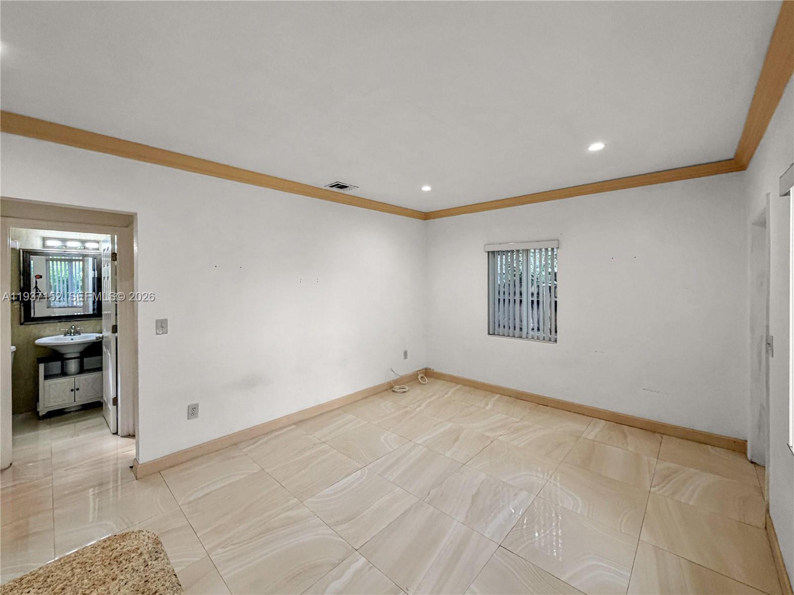 426 Northeast 77th Street, Unit 428 Miami, FL 33138 - Photo 5 of 22 a view of an empty room