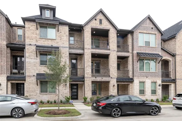 a car parked in front of a house