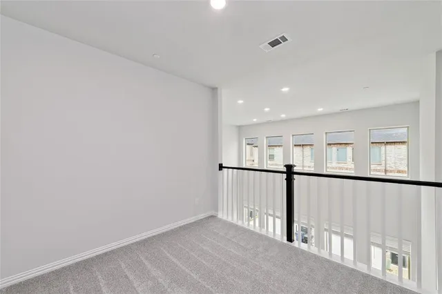 a view of staircase with wooden floor