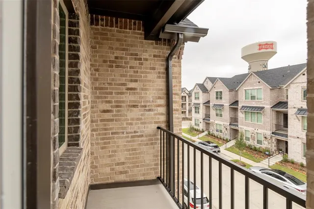 a view of a balcony with an outdoor space