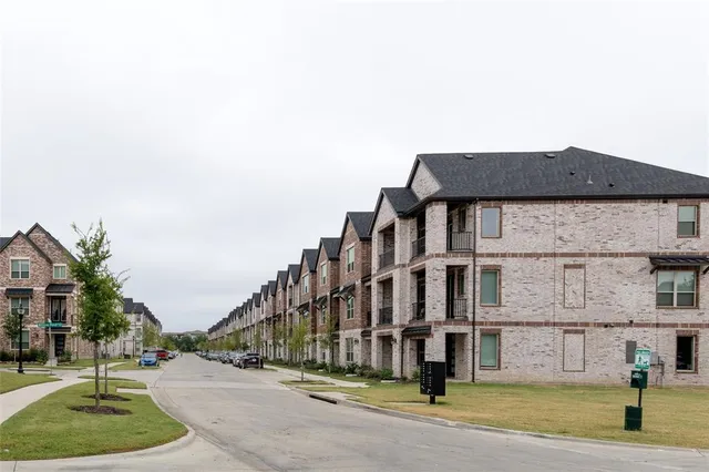 a front view of a building with street view