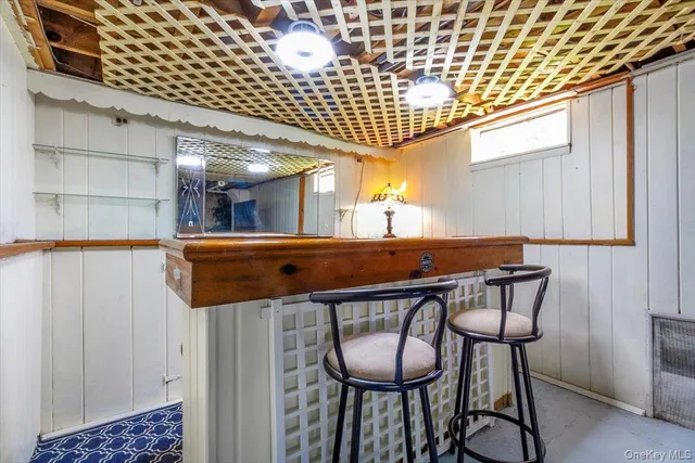 a kitchen with a table and chairs