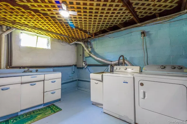 a utility room with dryer and washer
