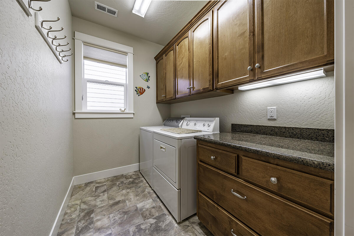 1078 North Haskell Street Central Point, OR 97502 - Photo 19 of 25 a room with storage and utility