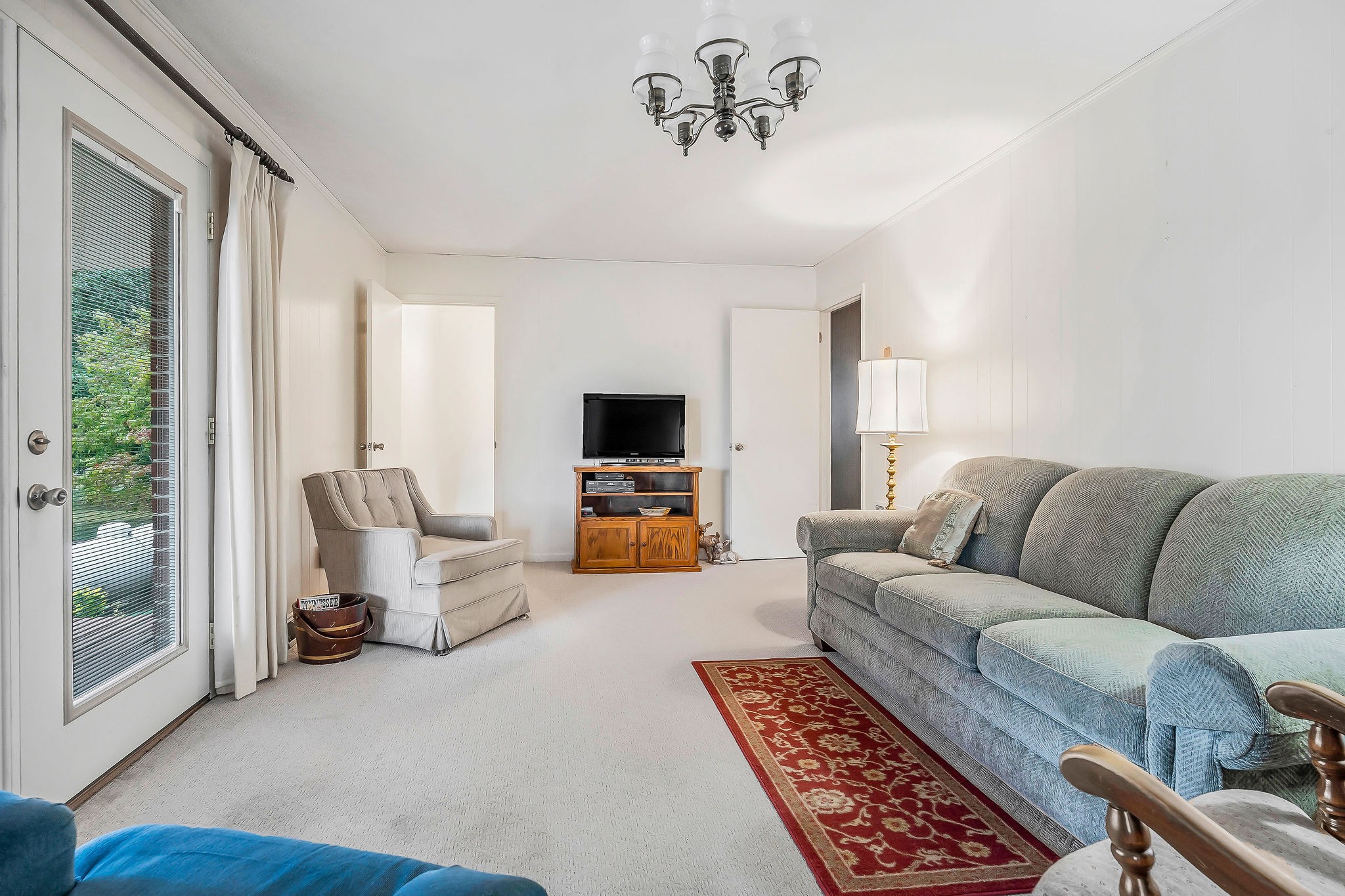 5036 Pendergrass Road Byrdstown, TN 38549 - Photo 17 of 38 a living room with furniture and a flat screen tv