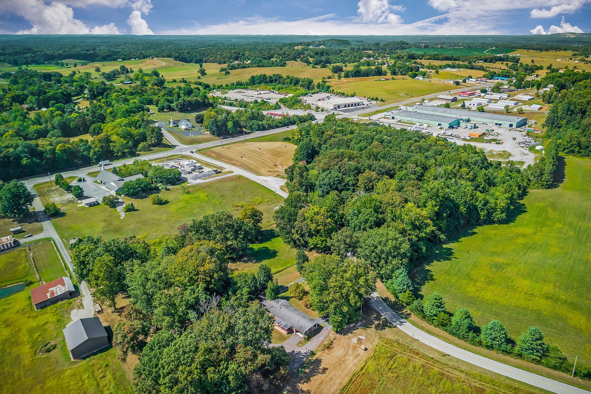 5036 Pendergrass Road Byrdstown, TN 38549 - Photo 38 of 38 an aerial view of a residential houses with outdoor space and trees all around