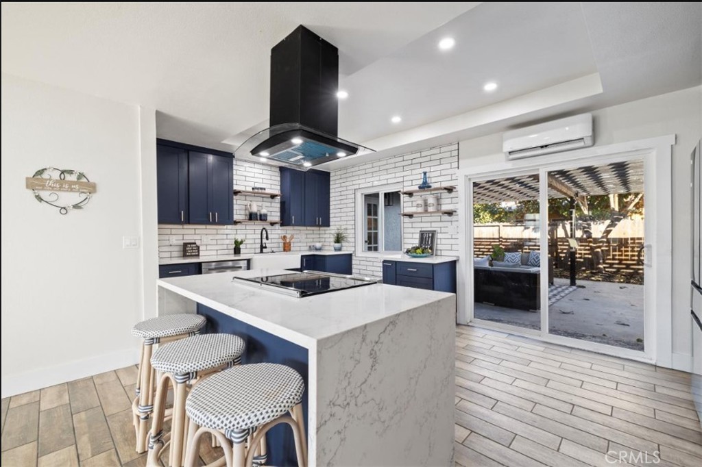 19472 Catfish Circle Huntington Beach, CA 92646 - Photo 2 of 30 a kitchen with a sink stainless steel appliances and cabinets