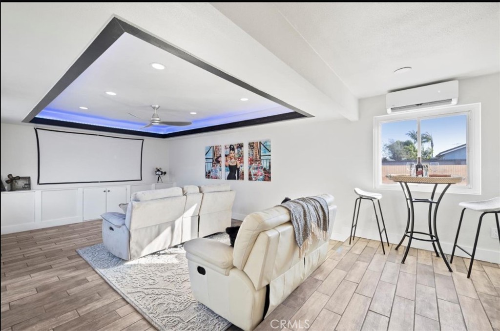 19472 Catfish Circle Huntington Beach, CA 92646 - Photo 6 of 30 a living room with furniture and a table