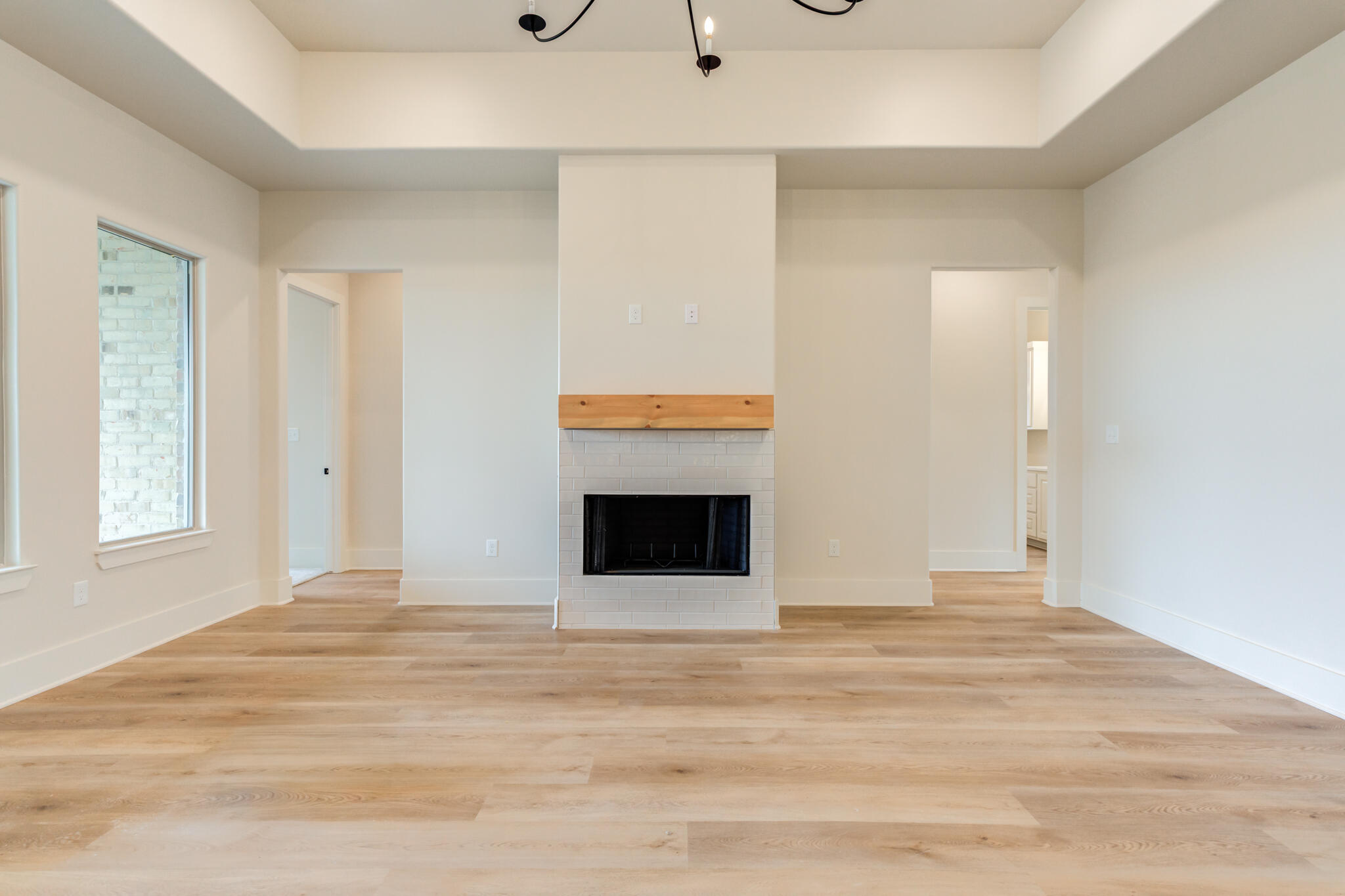 3516 141st Street Lubbock, TX 79423 - Photo 19 of 56 a view of an empty room with a window