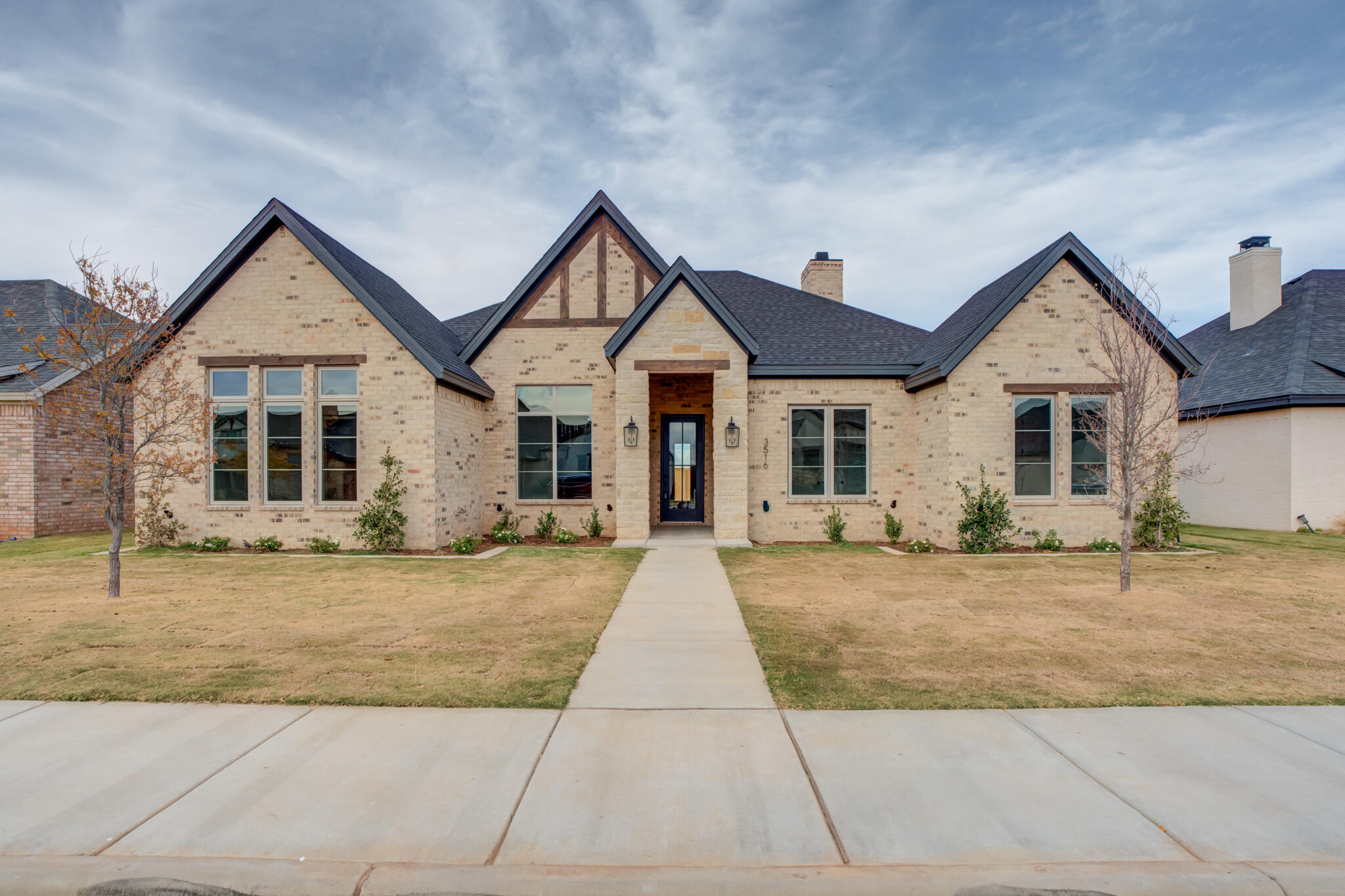 3516 141st Street Lubbock, TX 79423 - Photo 2 of 56 a view of a house with yard and road