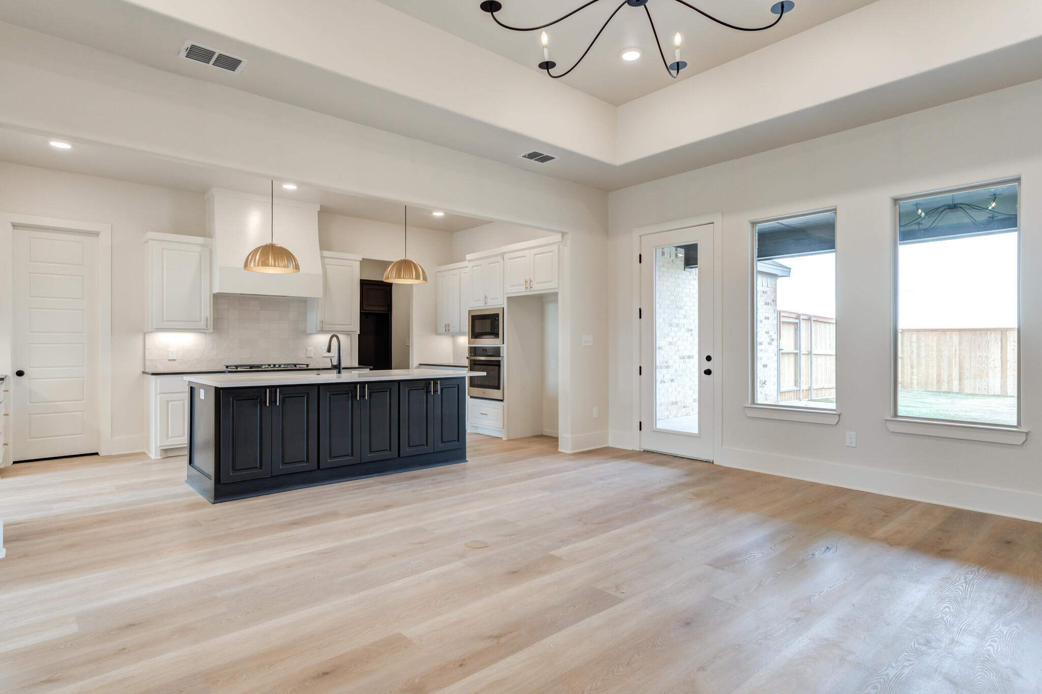 3516 141st Street Lubbock, TX 79423 - Photo 25 of 56 a view of kitchen with refrigerator and window