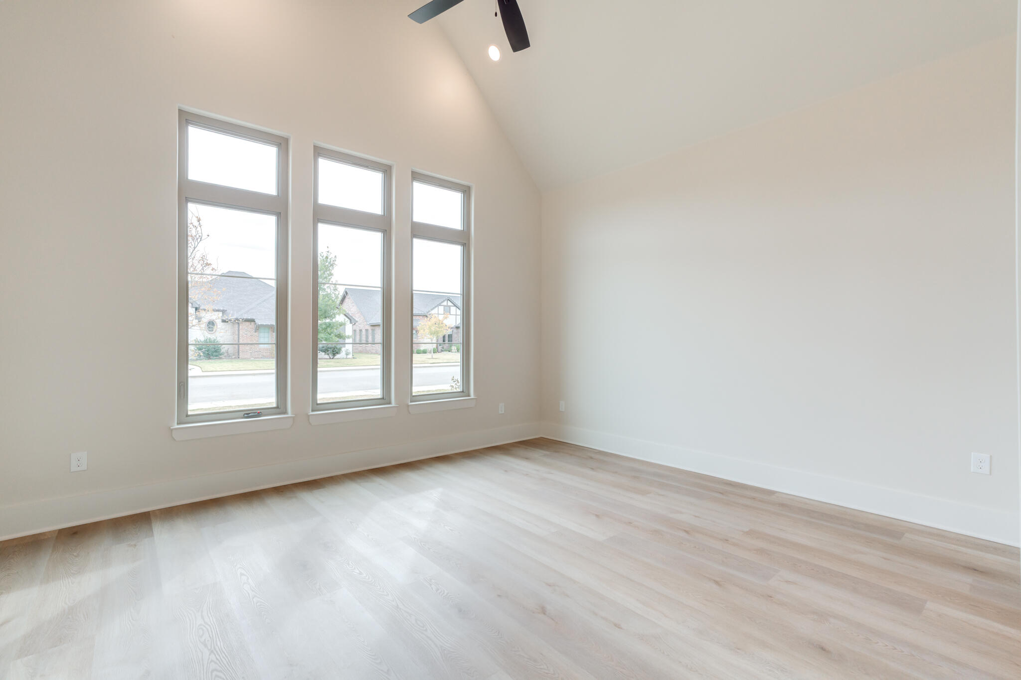 3516 141st Street Lubbock, TX 79423 - Photo 26 of 56 an empty room with wooden floor and windows