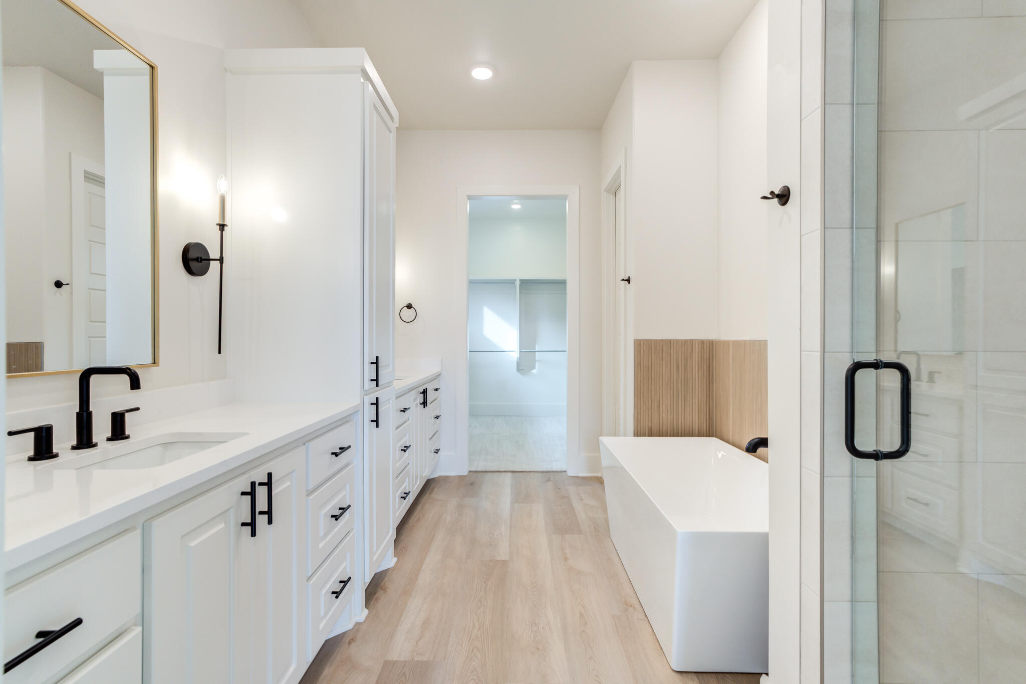 3516 141st Street Lubbock, TX 79423 - Photo 30 of 56 a bathroom with a tub sink and mirror