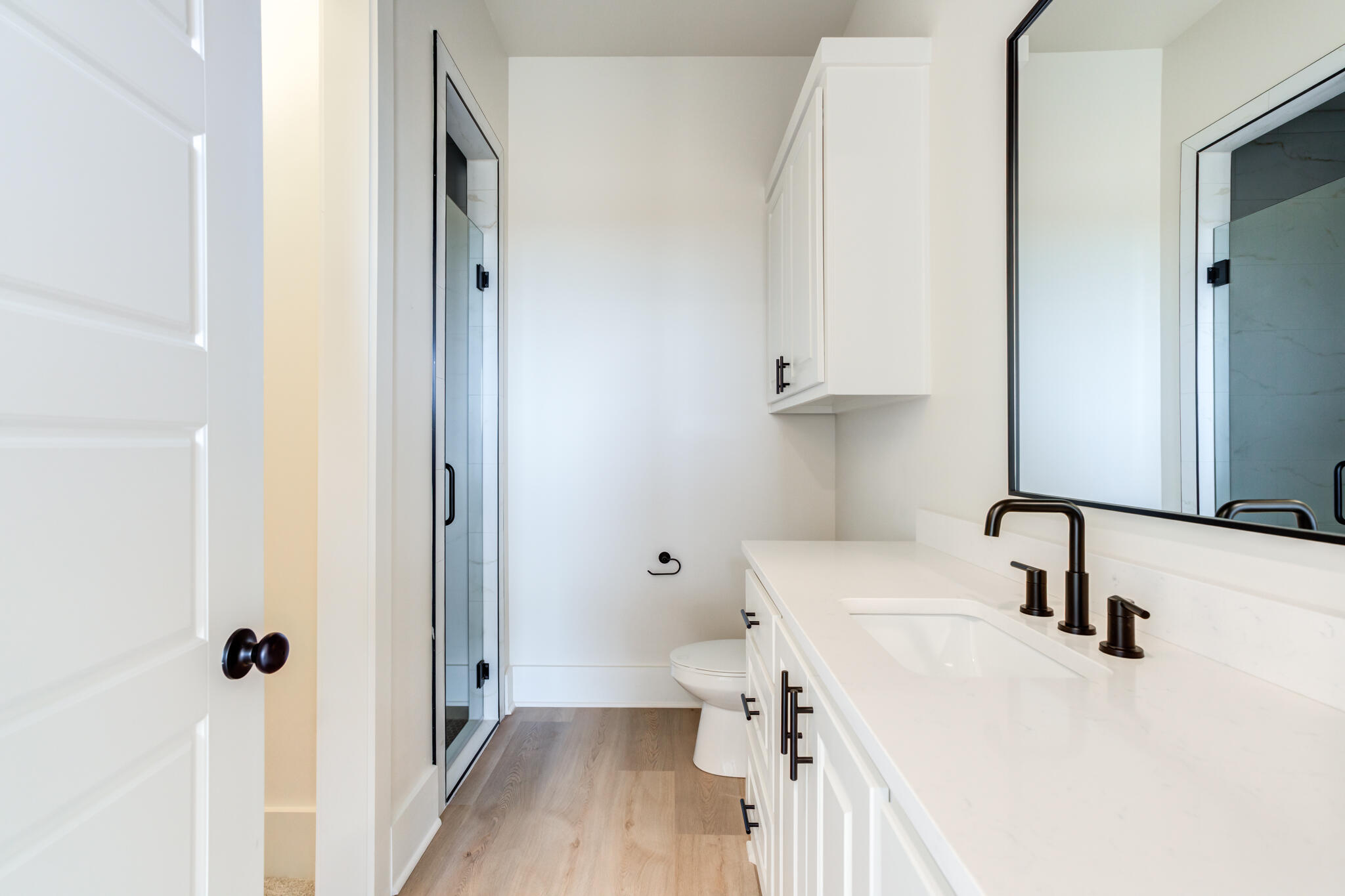 3516 141st Street Lubbock, TX 79423 - Photo 41 of 56 a bathroom with a sink toilet and shower
