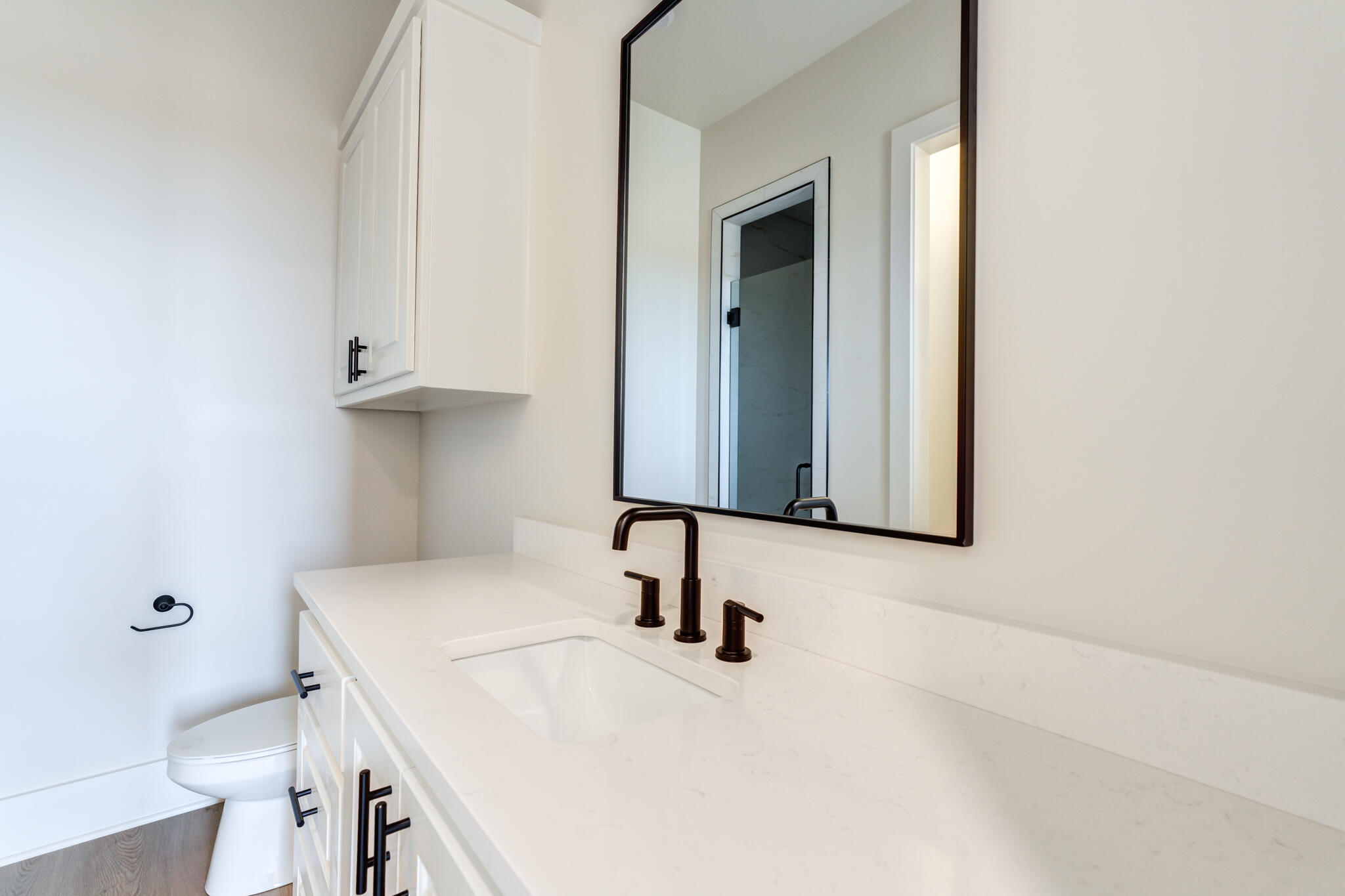 3516 141st Street Lubbock, TX 79423 - Photo 42 of 56 a bathroom with a sink and a mirror