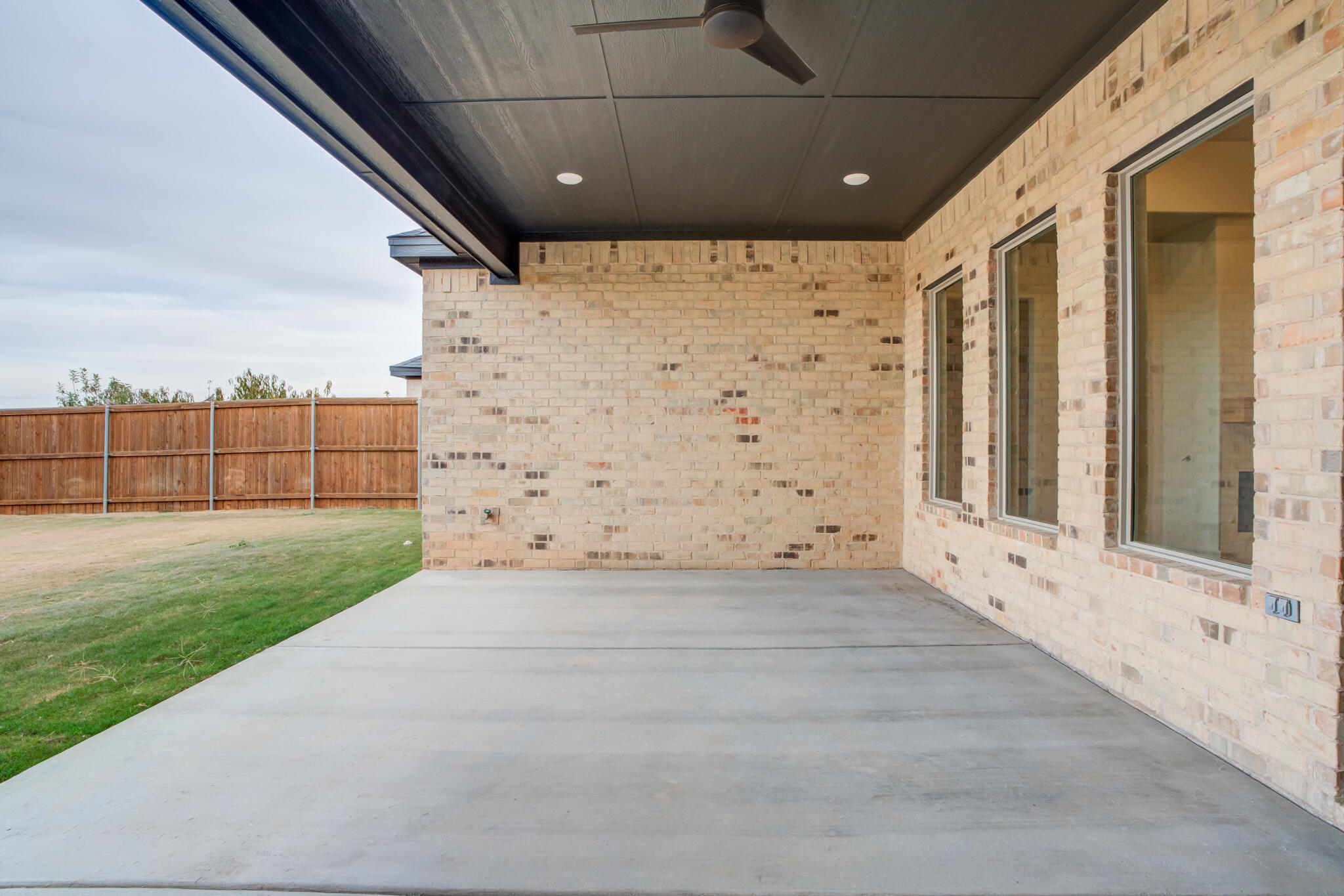 3516 141st Street Lubbock, TX 79423 - Photo 54 of 56 a view of an empty room with a fireplace