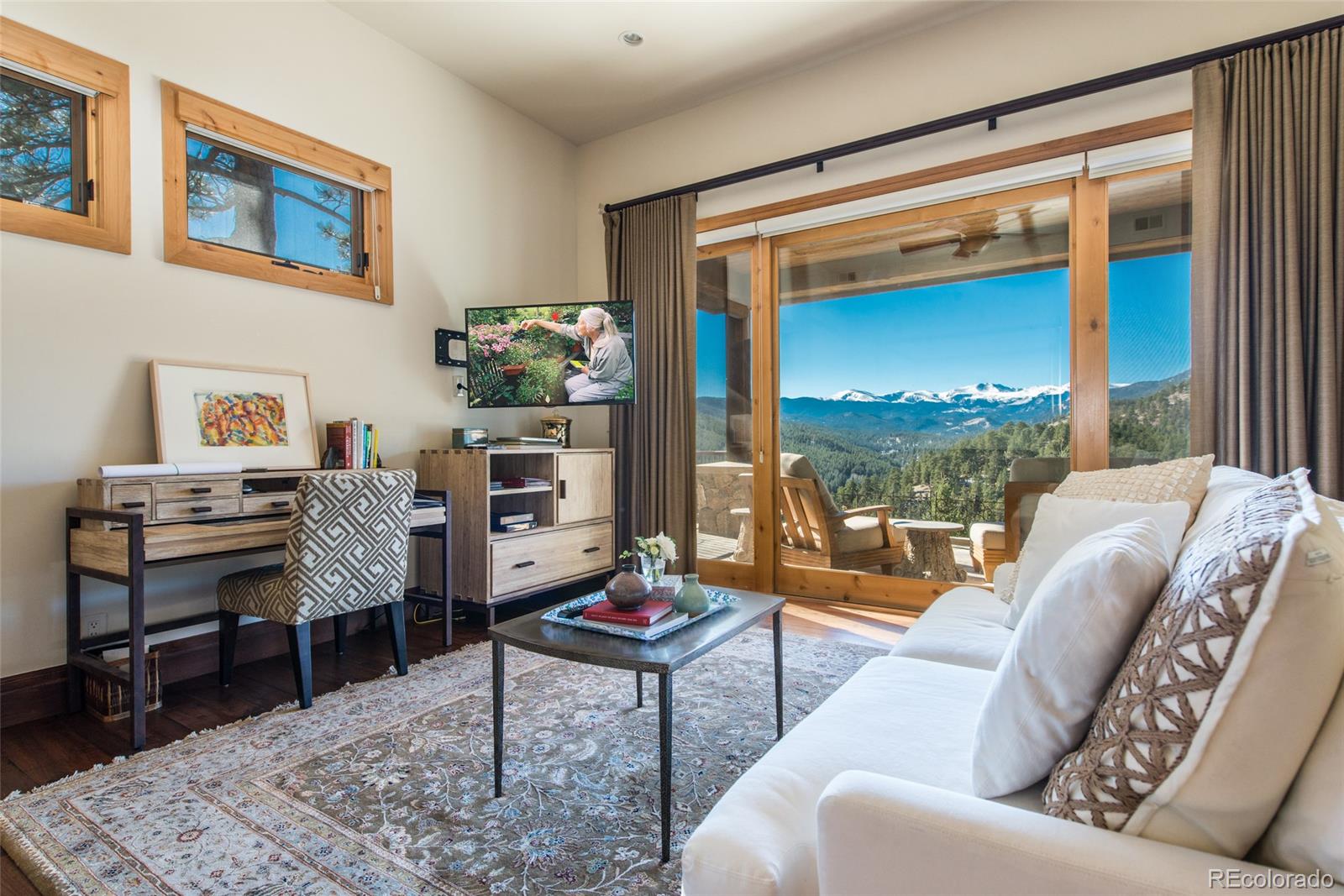 3731 Overlook Trail Evergreen, CO 80439 - Photo 15 of 35 a living room with furniture and a window