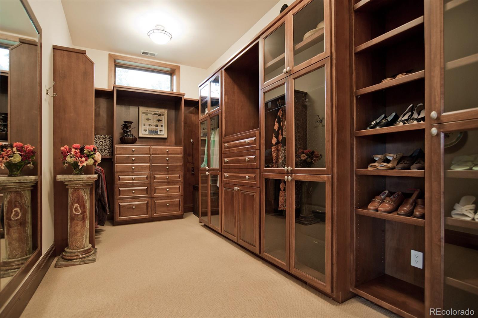 3731 Overlook Trail Evergreen, CO 80439 - Photo 20 of 35 a view of walk in closet with clothes and shoes