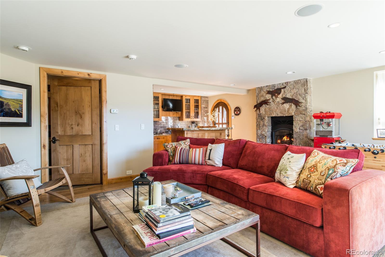 3731 Overlook Trail Evergreen, CO 80439 - Photo 29 of 35 a living room with furniture fireplace and a window