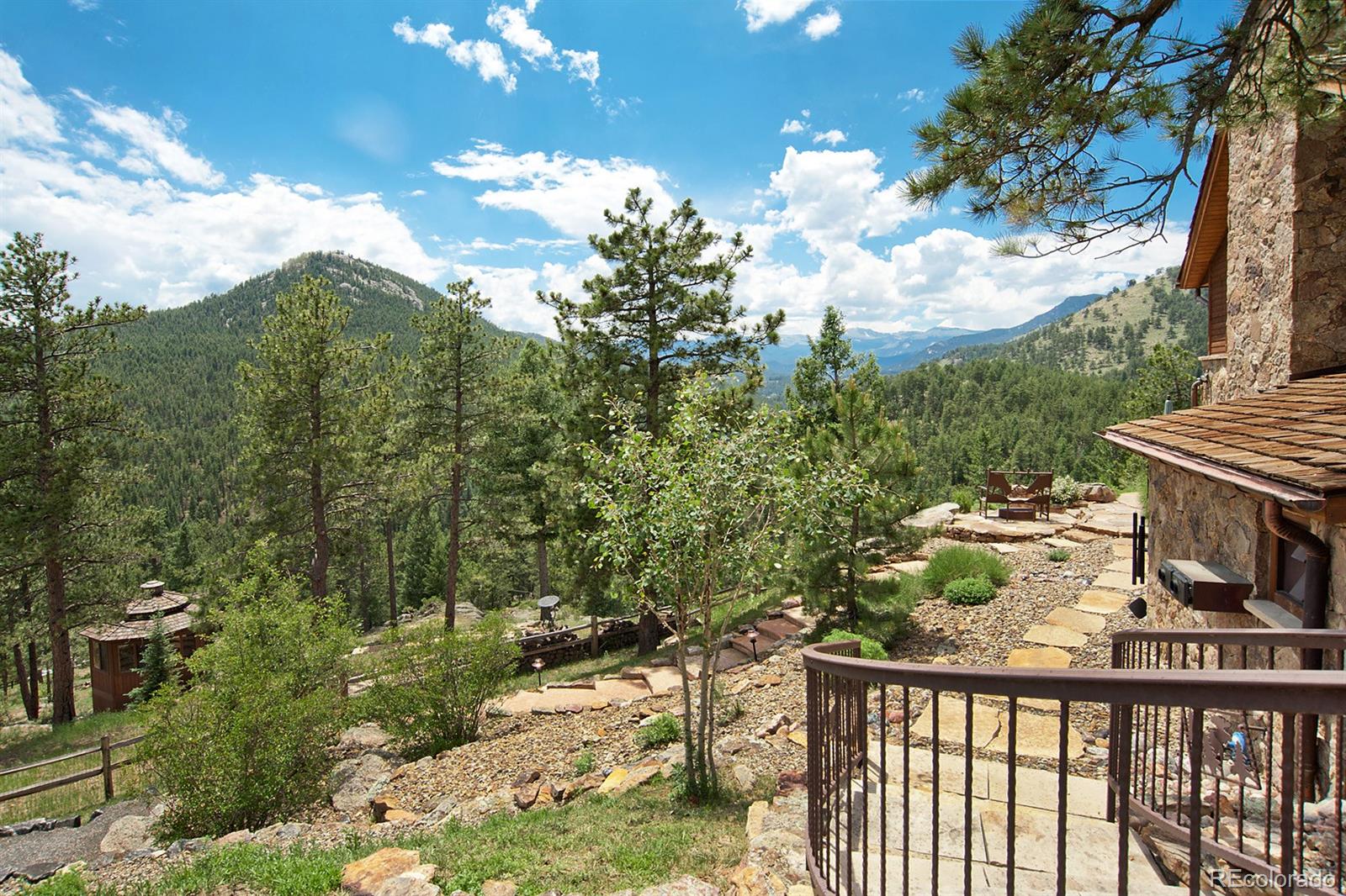 3731 Overlook Trail Evergreen, CO 80439 - Photo 35 of 35 a view of a city from a balcony