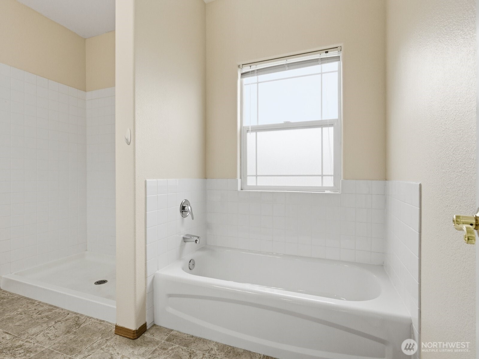 323 North Laventure Road, Unit C Mount Vernon, WA 98273 - Photo 16 of 24 a bathroom with a bathtub and a shower
