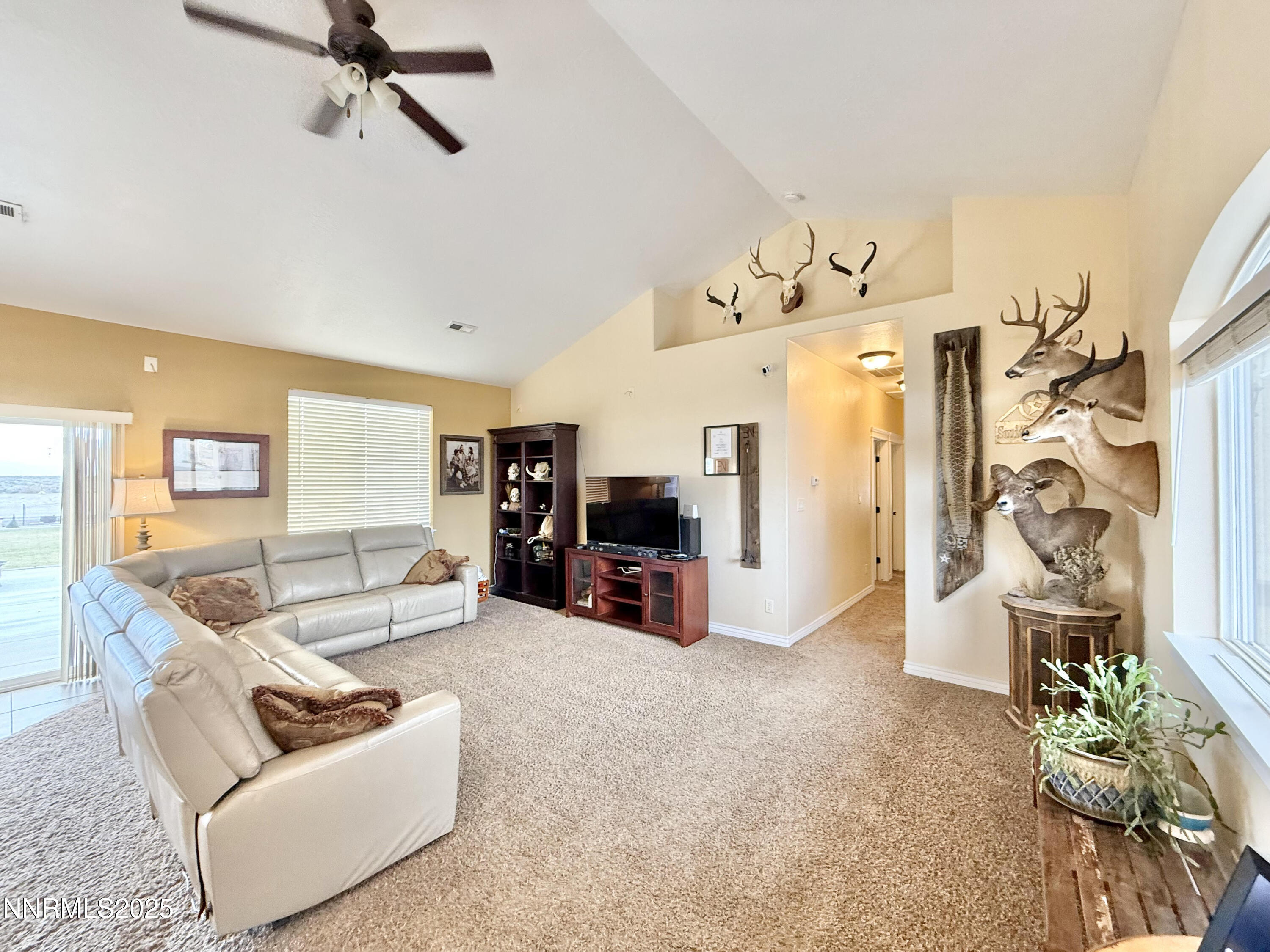 170 Blue Ridge Road Battle Mountain, NV 89820 - Photo 12 of 42 a living room with furniture and a flat screen tv
