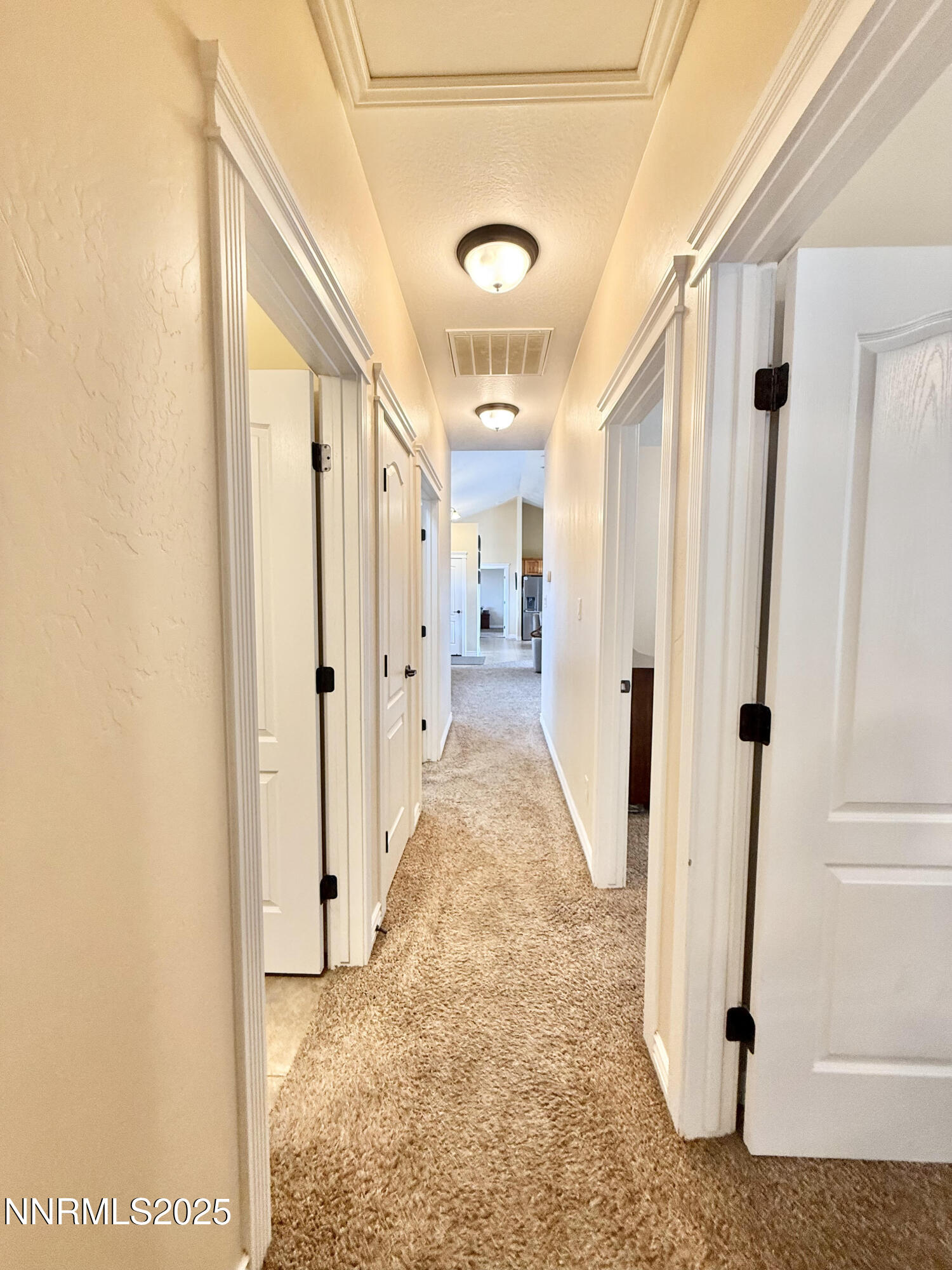 170 Blue Ridge Road Battle Mountain, NV 89820 - Photo 18 of 39 a view of a hallway with white walls and door