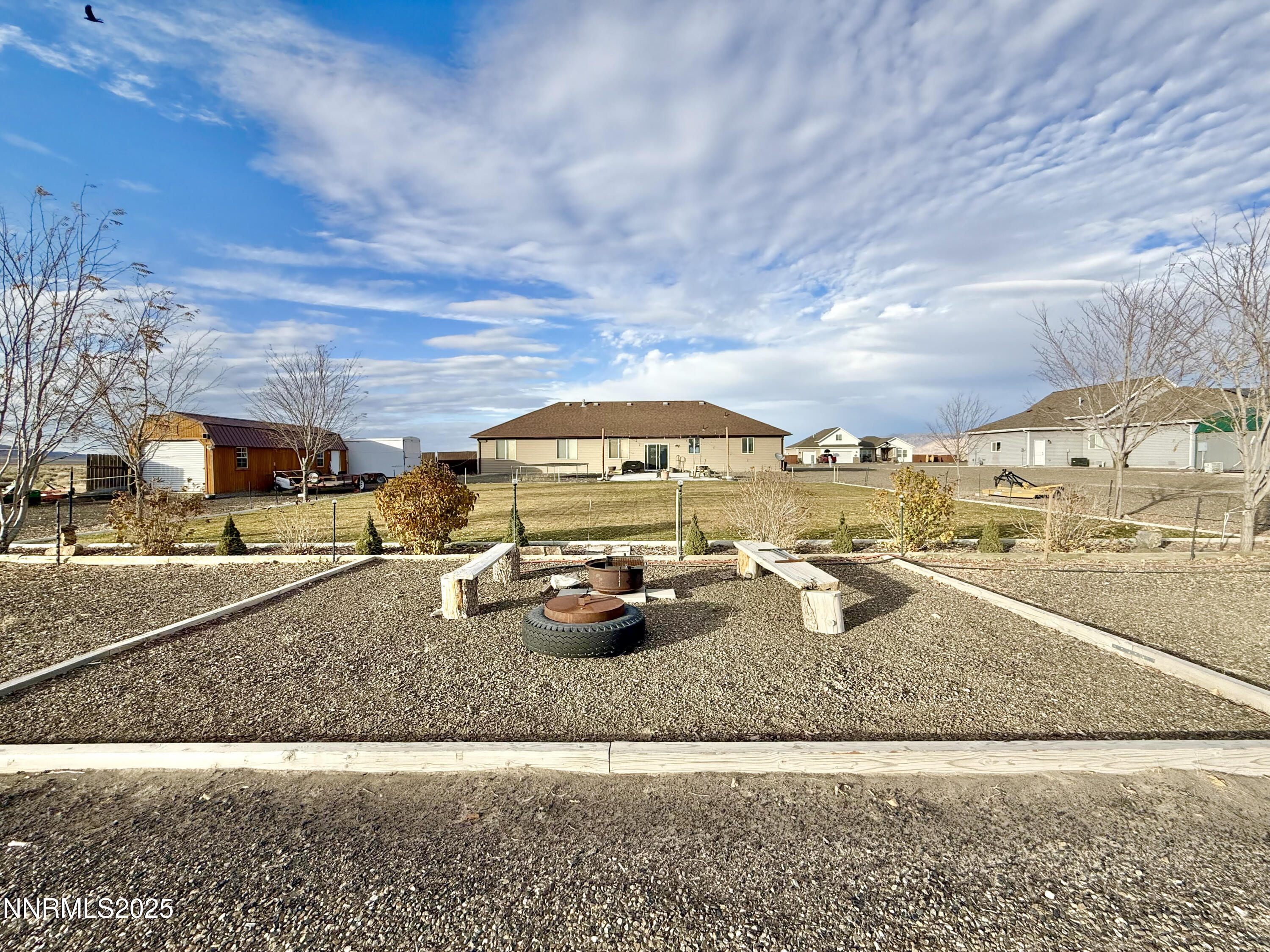 170 Blue Ridge Road Battle Mountain, NV 89820 - Photo 33 of 39 a view of a swimming pool with a yard