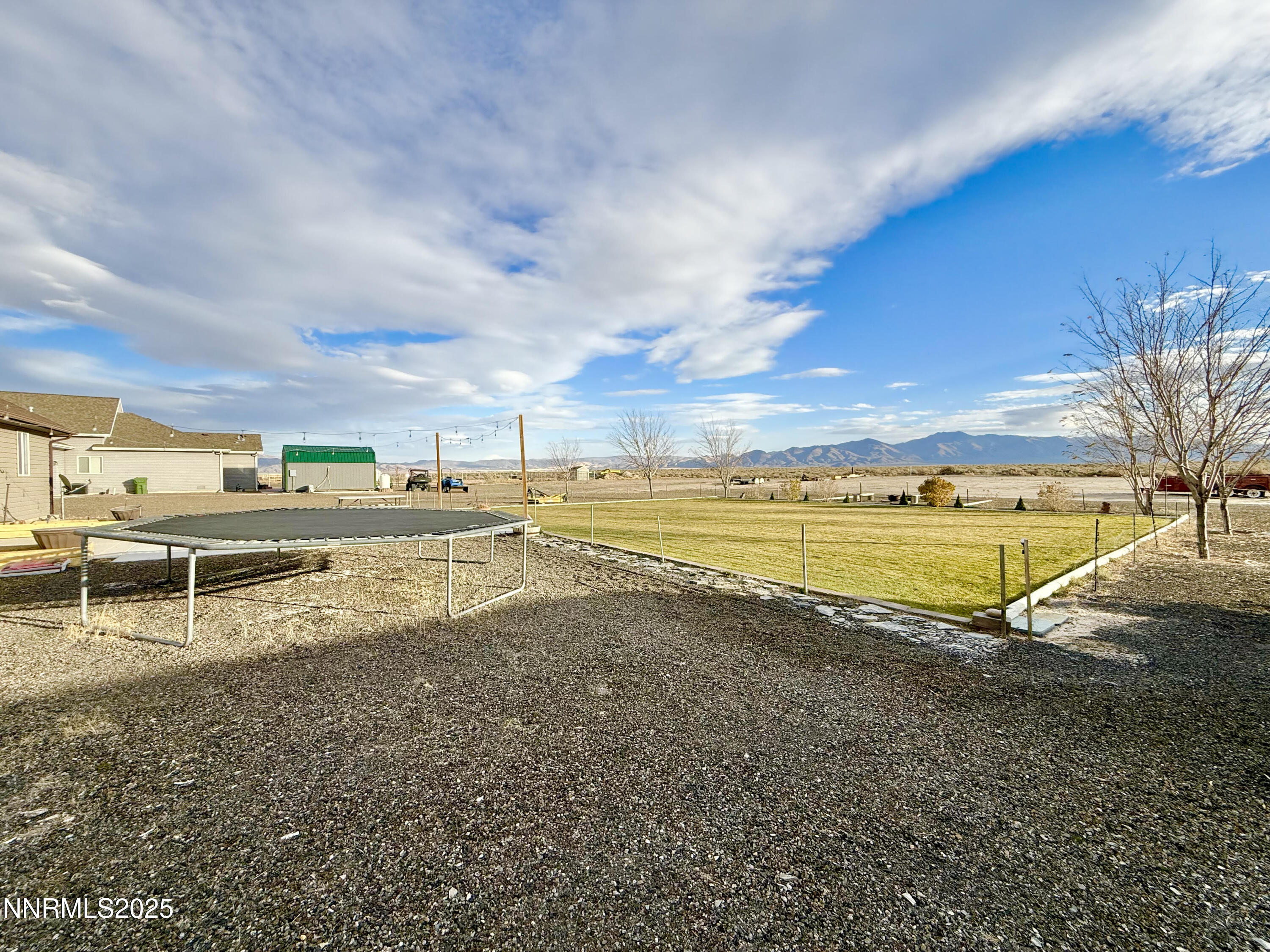 170 Blue Ridge Road Battle Mountain, NV 89820 - Photo 37 of 39 a view of a swimming pool with an outdoor seating and a yard