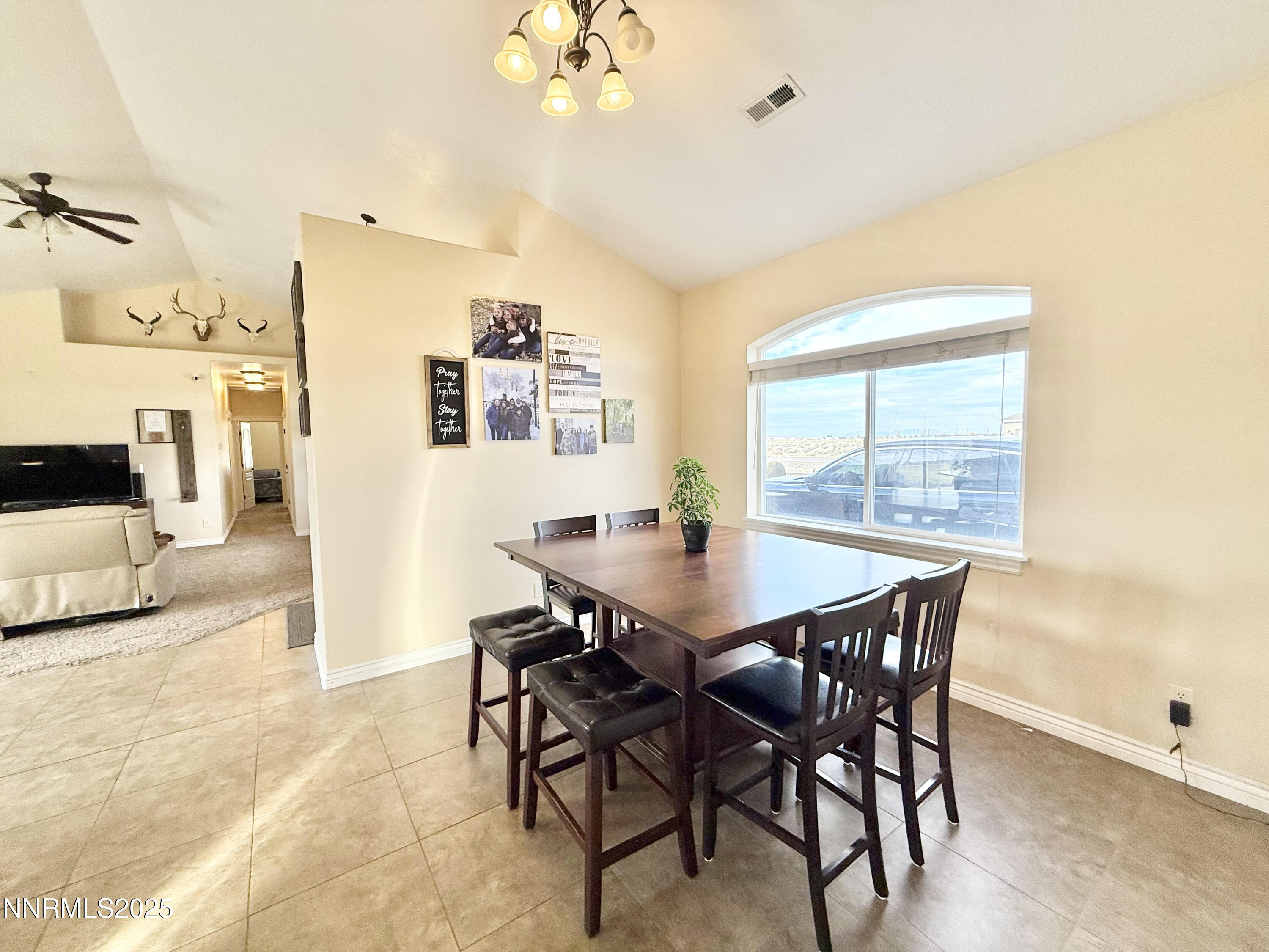 170 Blue Ridge Road Battle Mountain, NV 89820 - Photo 9 of 42 a view of a dining room with furniture and wooden floor