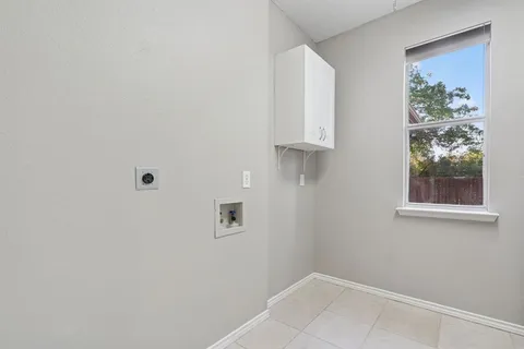 a view of a hallway with closet