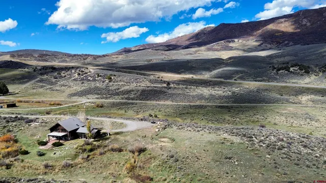 a view of a lake from a yard
