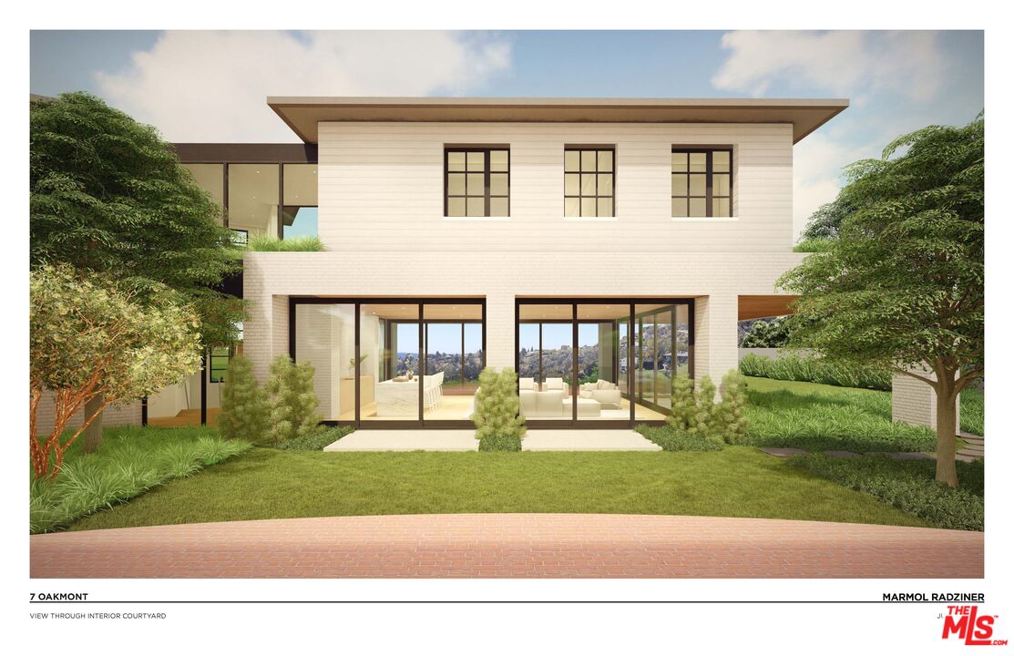 7 Oakmont Drive Los Angeles, CA 90049 - Photo 3 of 14 a front view of a house with a yard