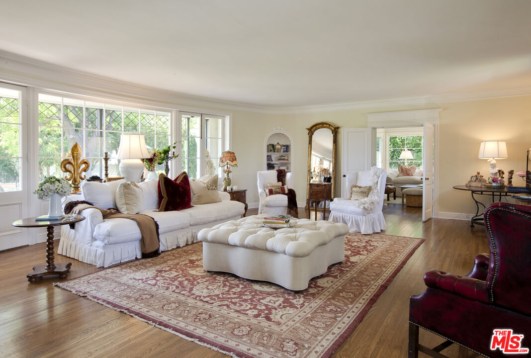 7 Oakmont Drive Los Angeles, CA 90049 - Photo 5 of 14 a living room with furniture and a large window
