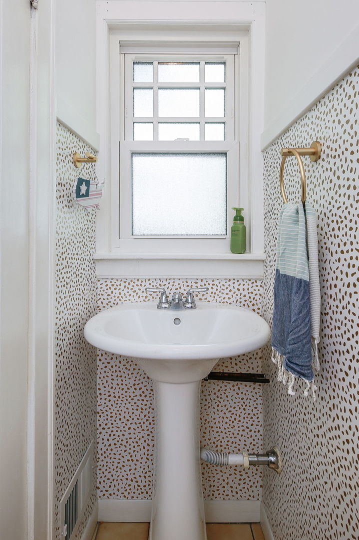 429 East Illinois Street Wheaton, IL 60187 - Photo 13 of 30 a bathroom with a sink and a mirror