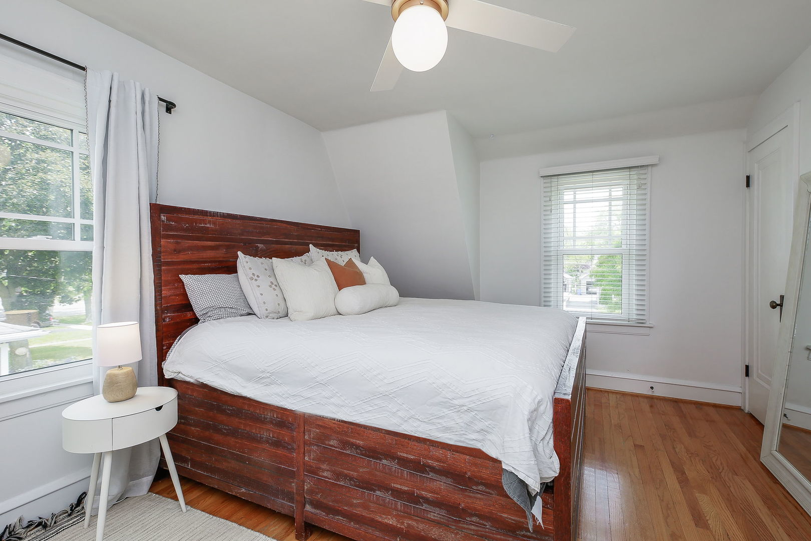 429 East Illinois Street Wheaton, IL 60187 - Photo 14 of 30 a bedroom with a bed and window