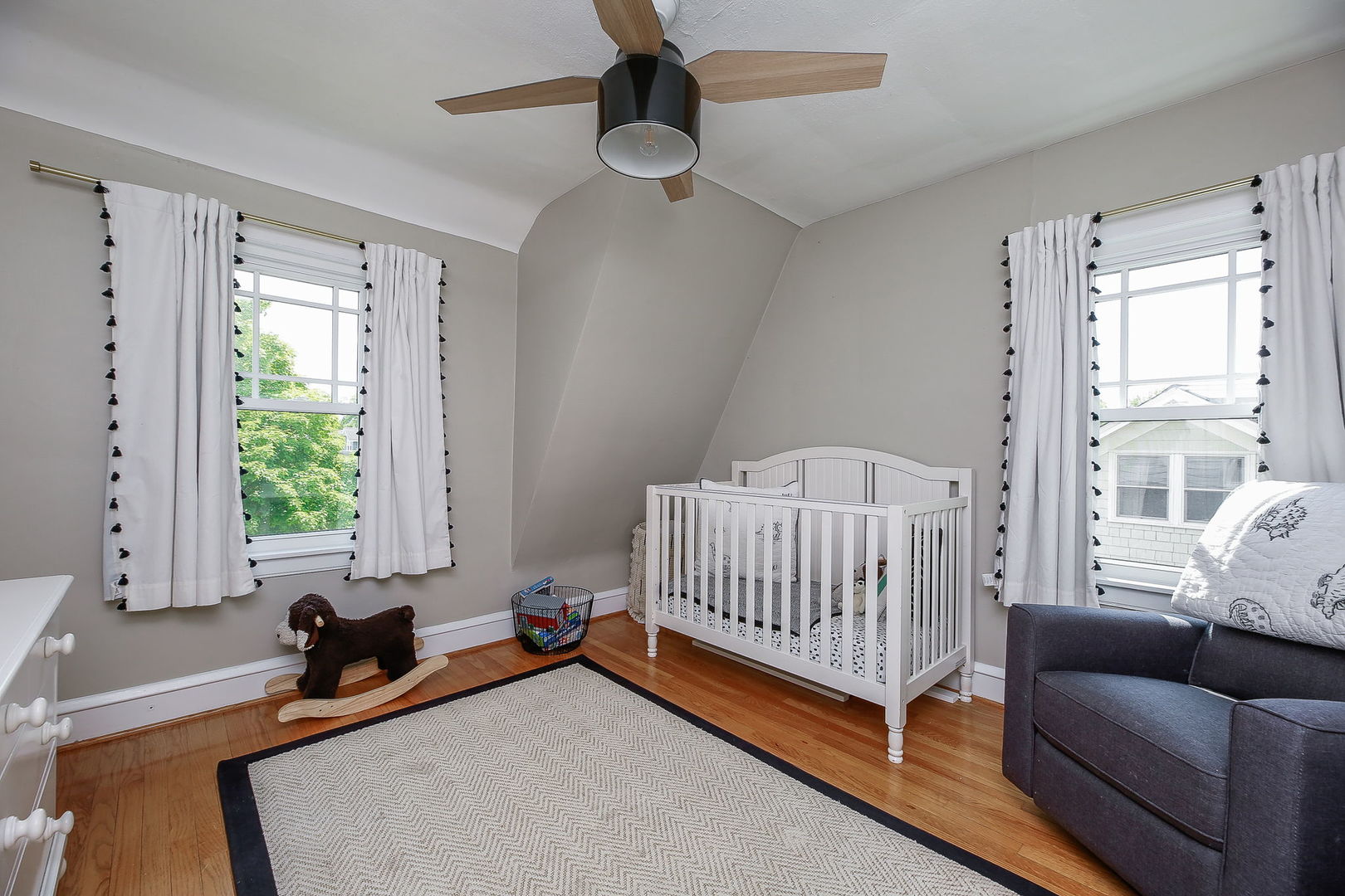 429 East Illinois Street Wheaton, IL 60187 - Photo 17 of 30 a bedroom with a bed and a window