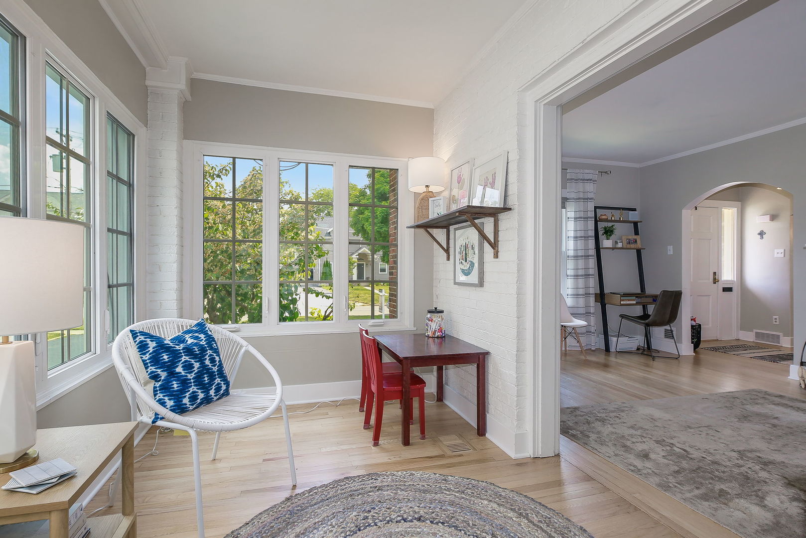 429 East Illinois Street Wheaton, IL 60187 - Photo 7 of 30 a living room with furniture and a large window