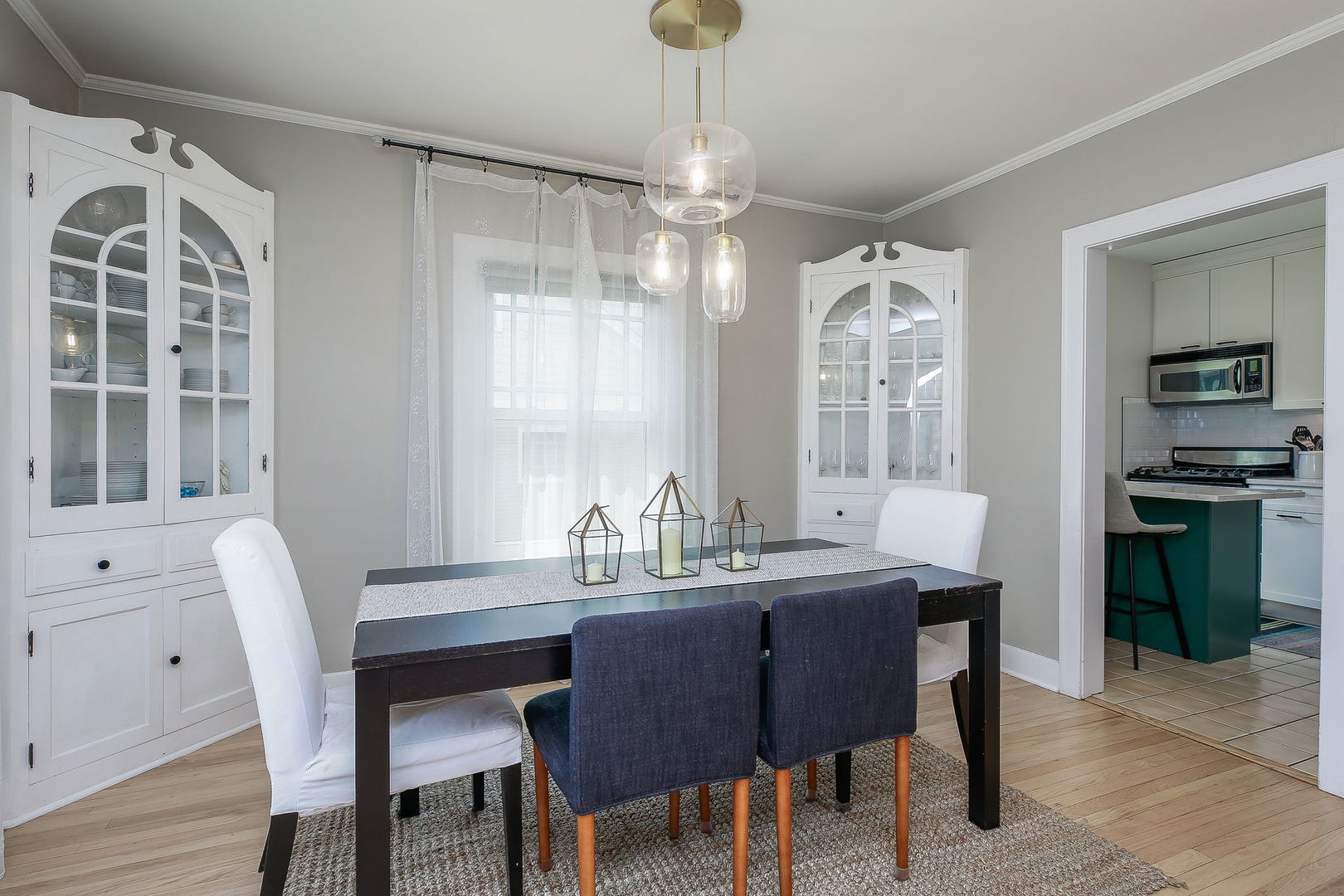 429 East Illinois Street Wheaton, IL 60187 - Photo 8 of 30 a view of a dining room with furniture window and wooden floor